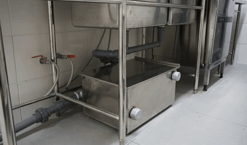 Bradley Fire & Environmental Services can help your operation with Indiana Kitchen Fire Suppression services image shows kitchen grease trap