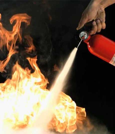 Manage Indiana Kitchen Fire Suppression with help from Bradley Fire & Environmental Services image shows fire extinguisher and fire