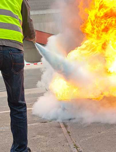 Work with Bradley Fire & Environmental Services for Indiana Kitchen Fire Suppression image shows fire being extinguished