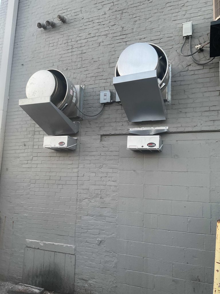 Address Indiana Kitchen Fire Suppression with Bradley Fire & Environmental Services image shows equipment on wall