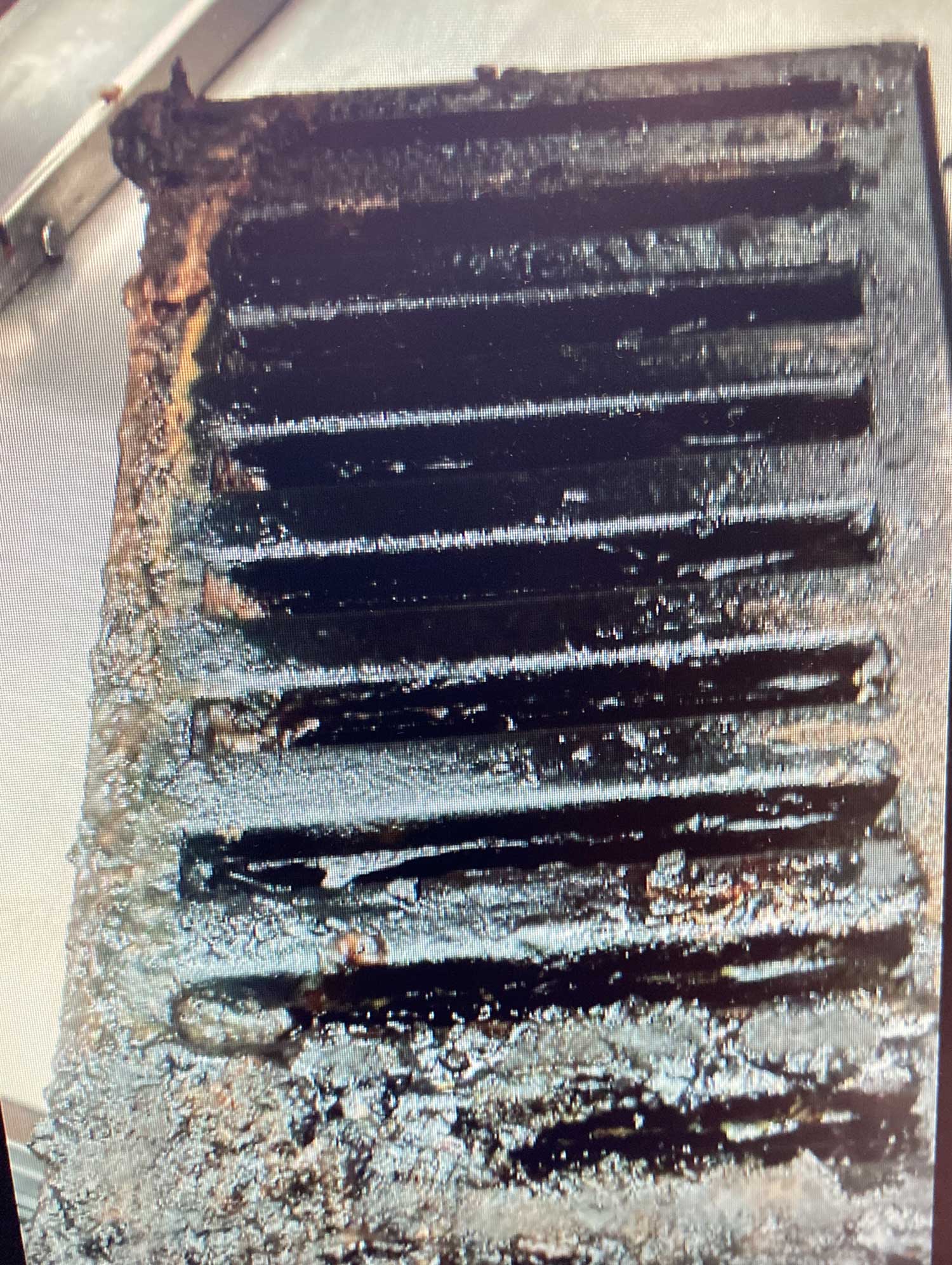 Reach out to Bradley Fire & Environmental Services for Indiana Kitchen Fire Suppression expertise image shows dirty hood filter